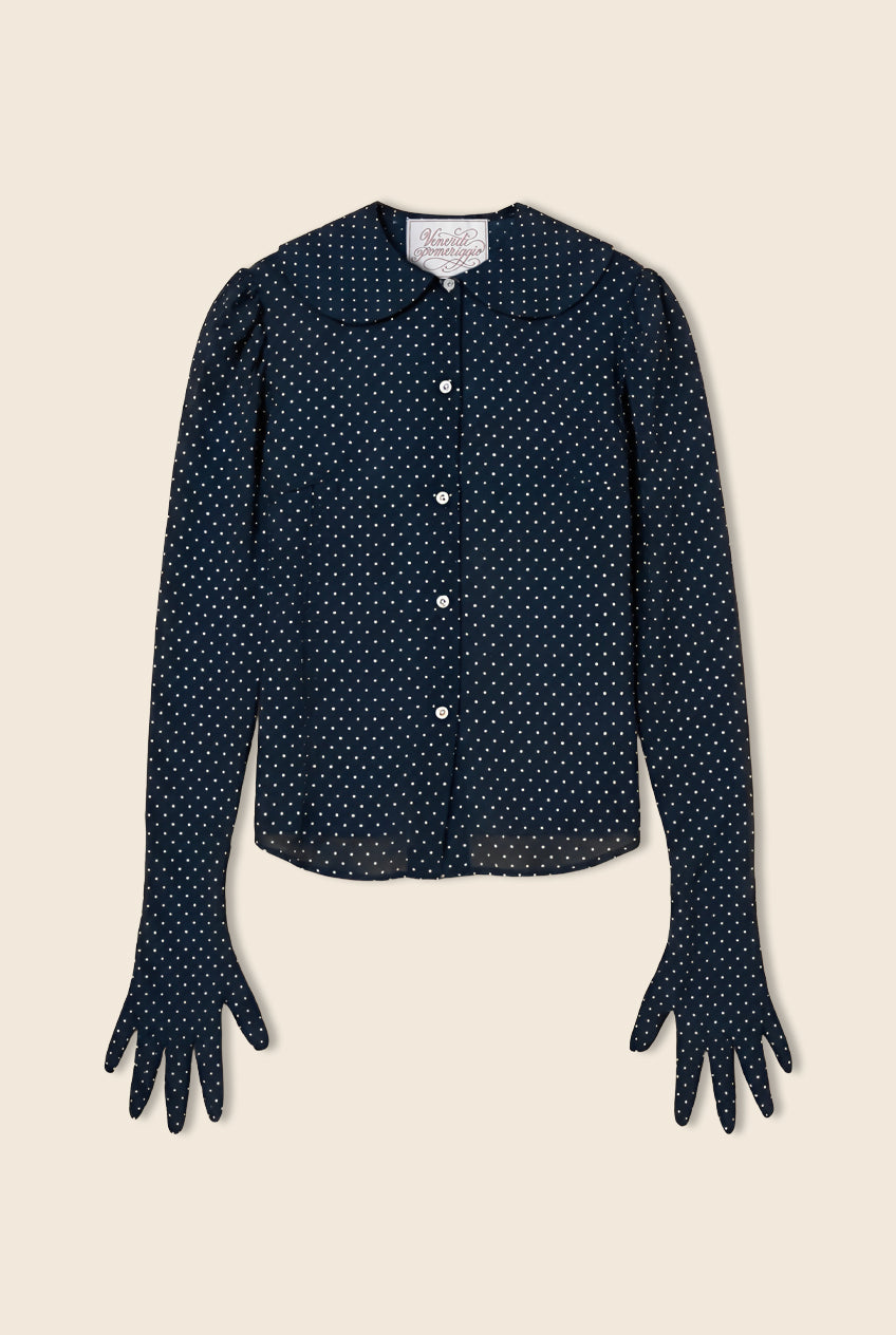 Navy blue button down shirt with white polka dots and sleeves that go down into gloves