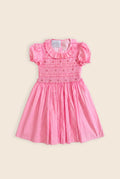 mini pink dress with gingham print and smock detailing 